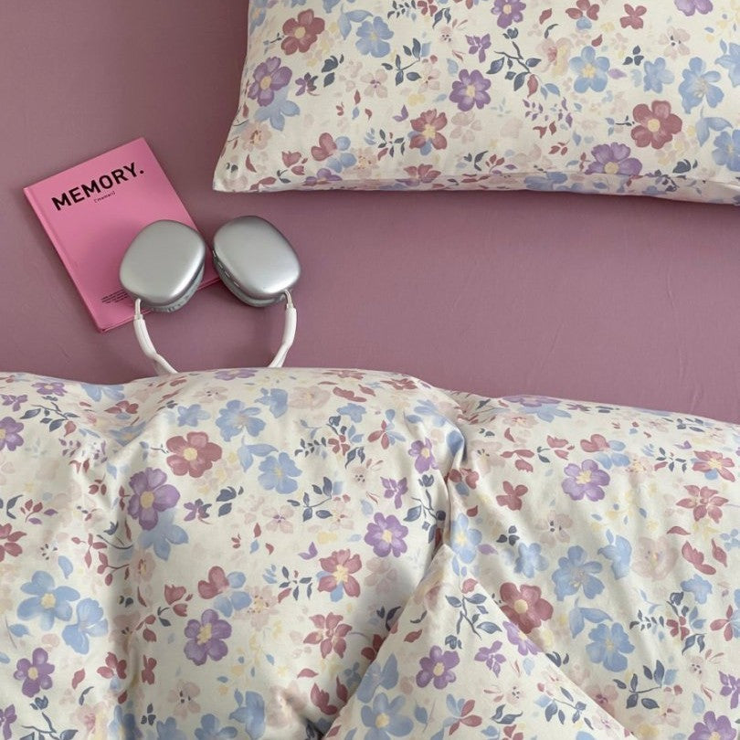 Light cotton bedding set with quilted topper and fine stripe pattern
