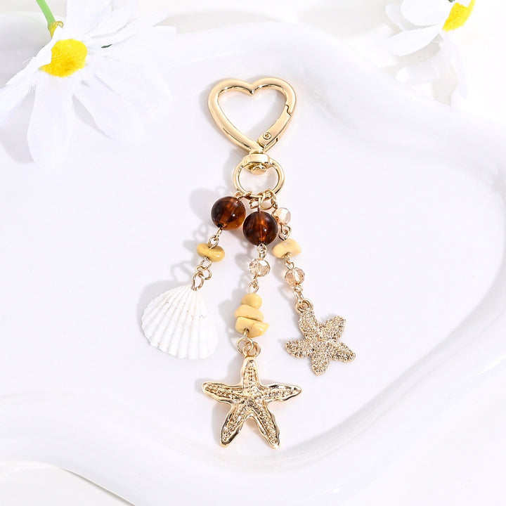 Keychain with Sparkling Sun Motif Kalsten