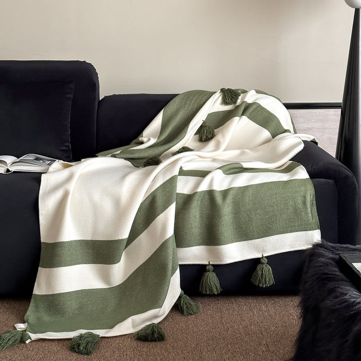 Soft woven blanket with tassels and diagonal stripes