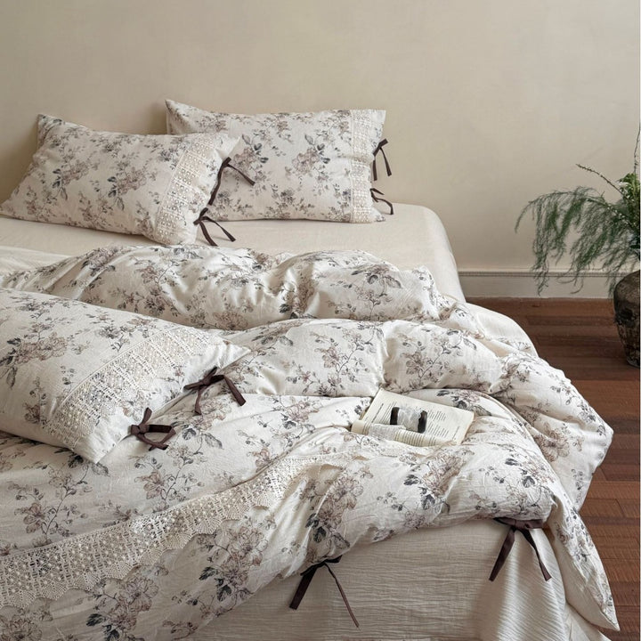 Romantic cotton-linen bedding set with lace trim and decorative ribbons