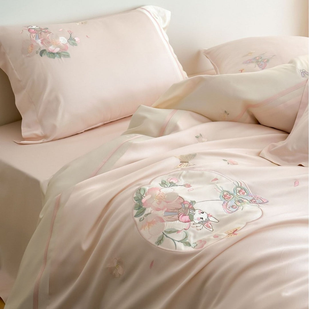 Satin bedding set with delicate butterfly and flower embroidery