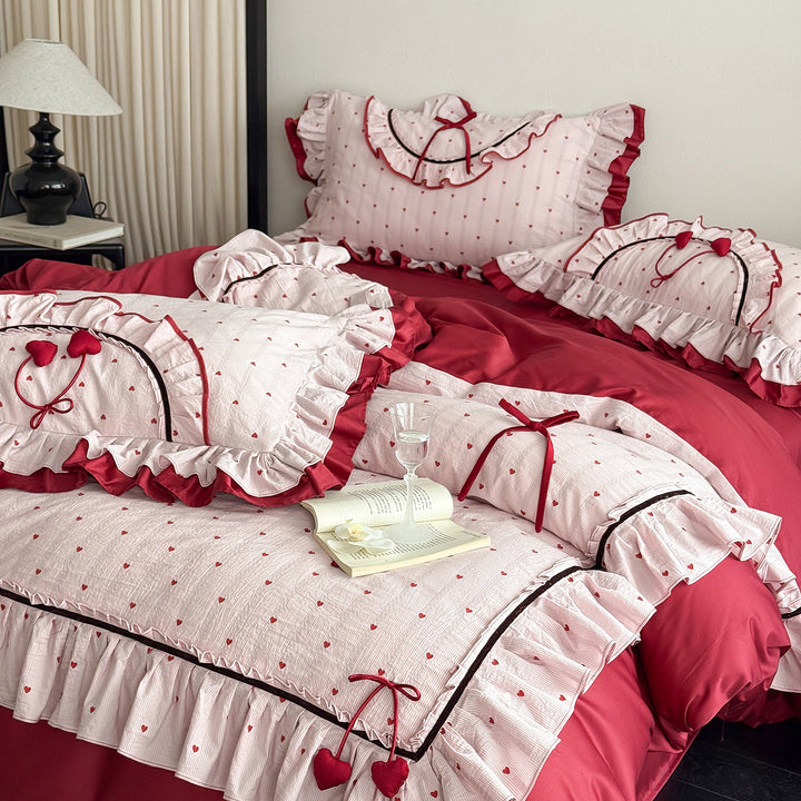 Romantic cotton bedding set with ruffle, heart embroidery and decorative pillow Kalsten
