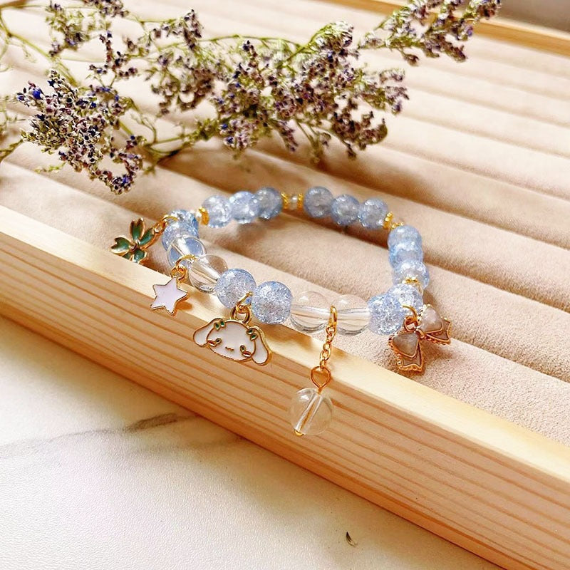 Elegant bracelet with animal and glitter pendants Kalsten