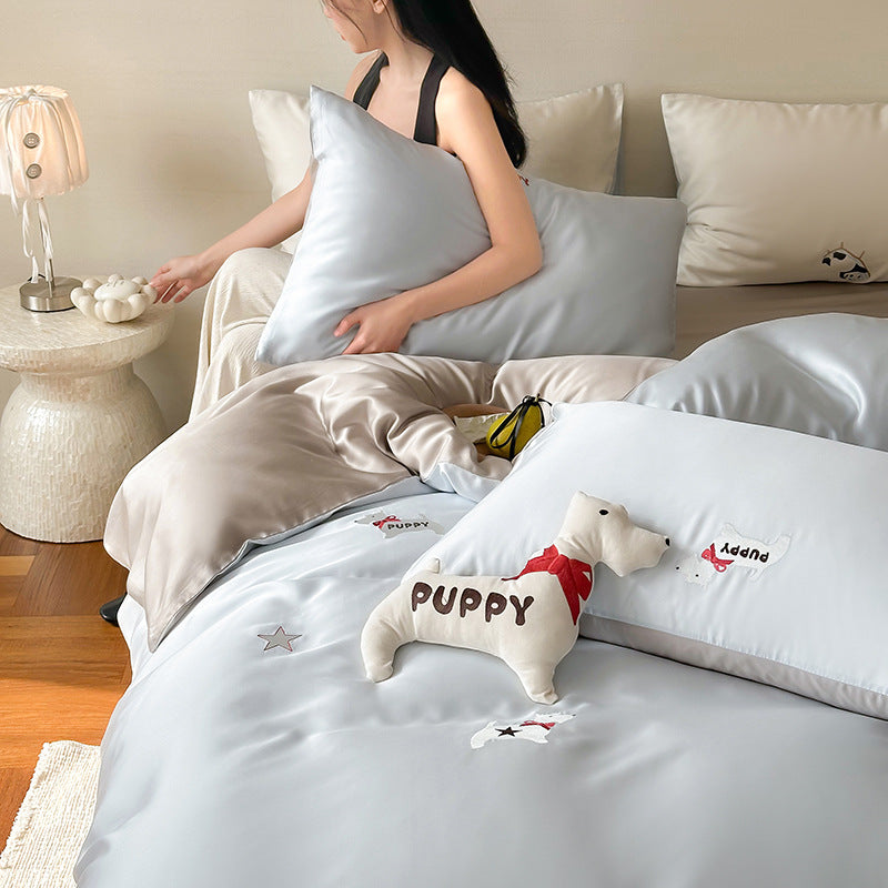 Luxurious satin bedding set with embroidered cherry motifs, reversible function and plush bunny pillow