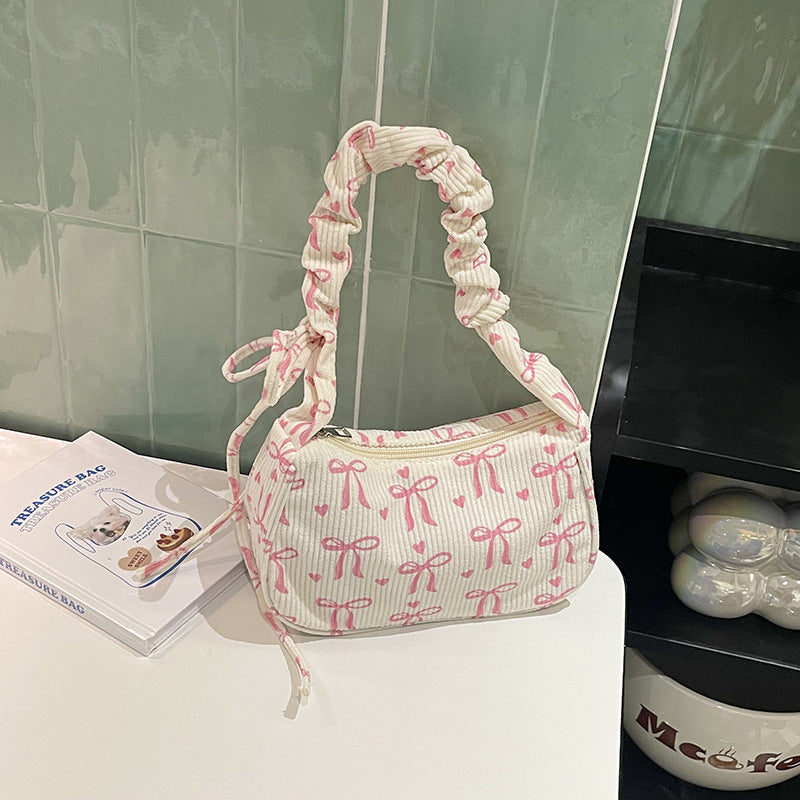 Playful Bow-Print Shoulder Bag