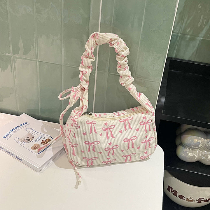 Playful Bow-Print Shoulder Bag
