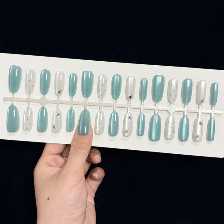 Artistic Press-On Nail Design with 3D Accents Kalsten