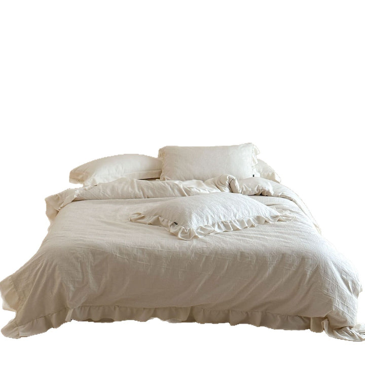 Quilted cotton-linen duvet cover set with subtle wrinkled texture and ruffle