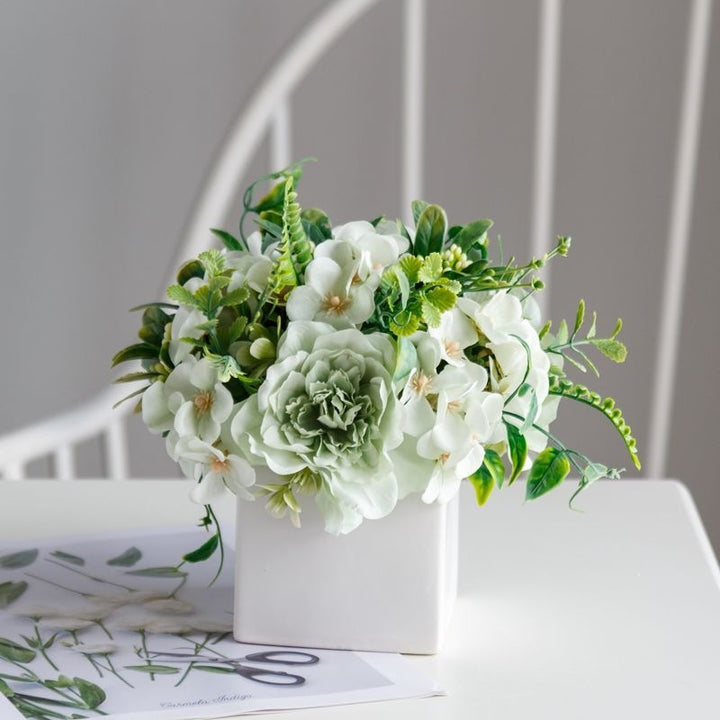 Lifelike Floral Arrangement in Decorative Square Planter