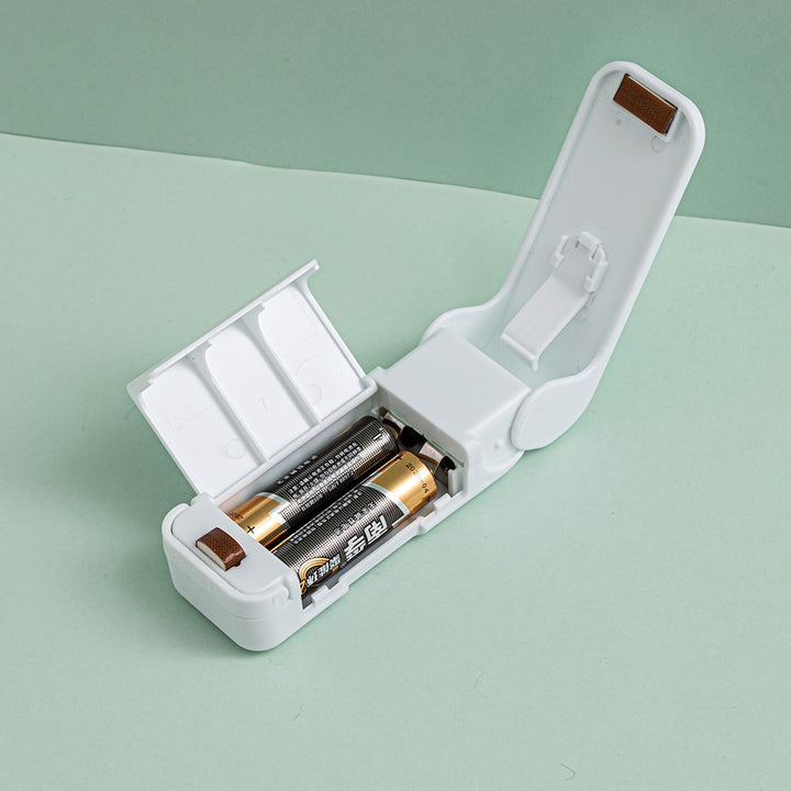 Compact Handheld Thermal Bag Sealer With Safety Guard