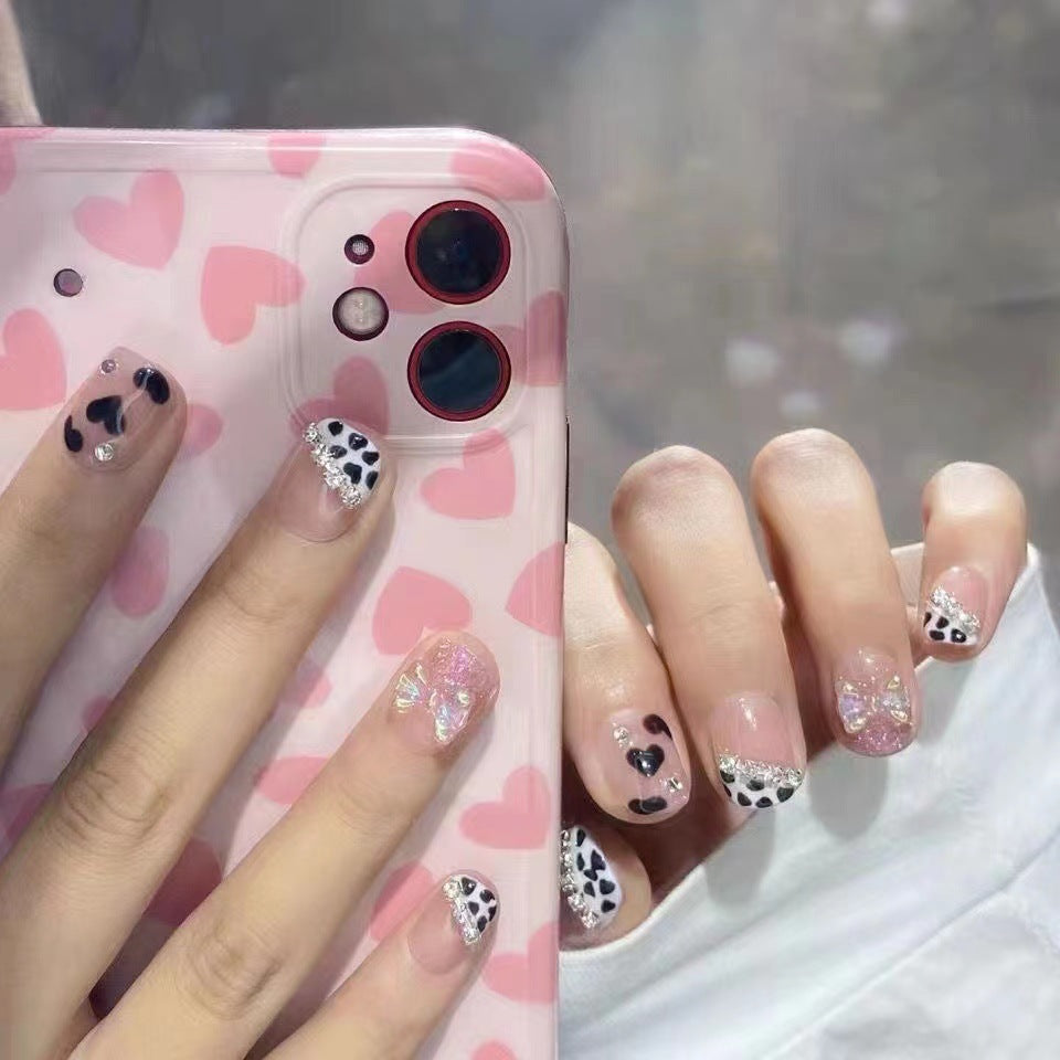 Decorative Press-On Nail Set with Elegant Heart and Bow Accents