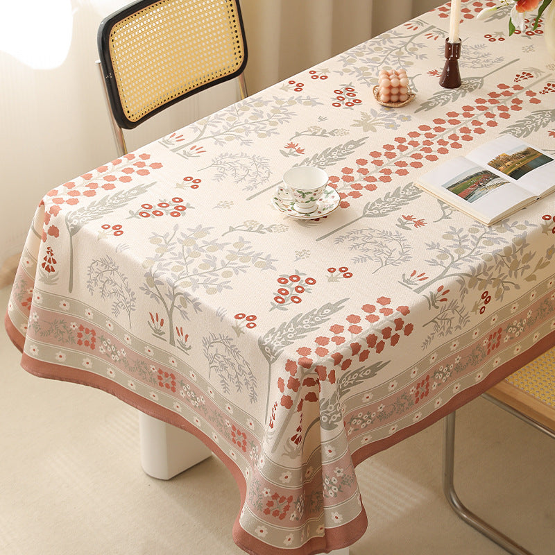 Rectangular easy-care tablecloth in floral jacquard with decorative border Kalsten