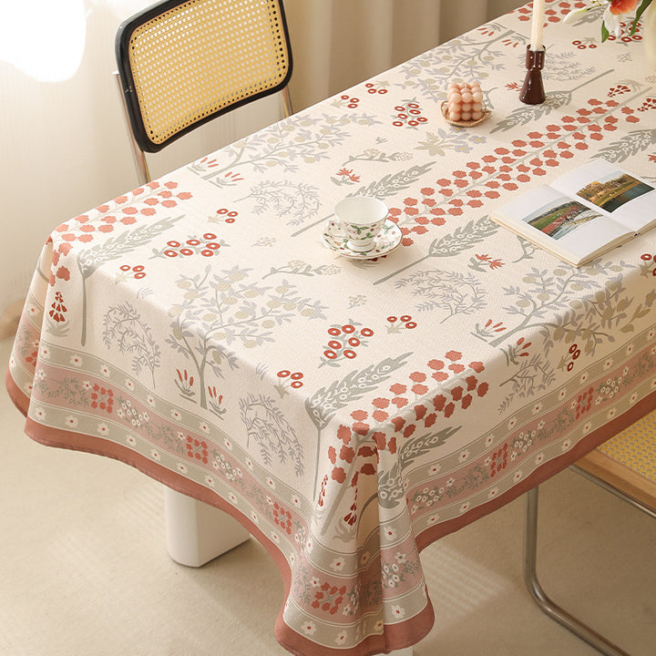 Rectangular easy-care tablecloth in floral jacquard with decorative border Kalsten