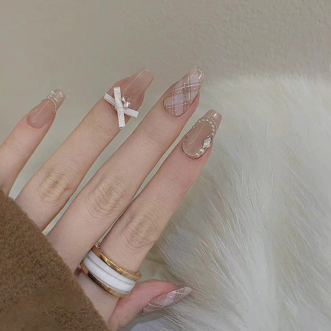 Elegant Press-On Nail Art Set with Ribbons and Gemstone Accents Kalsten