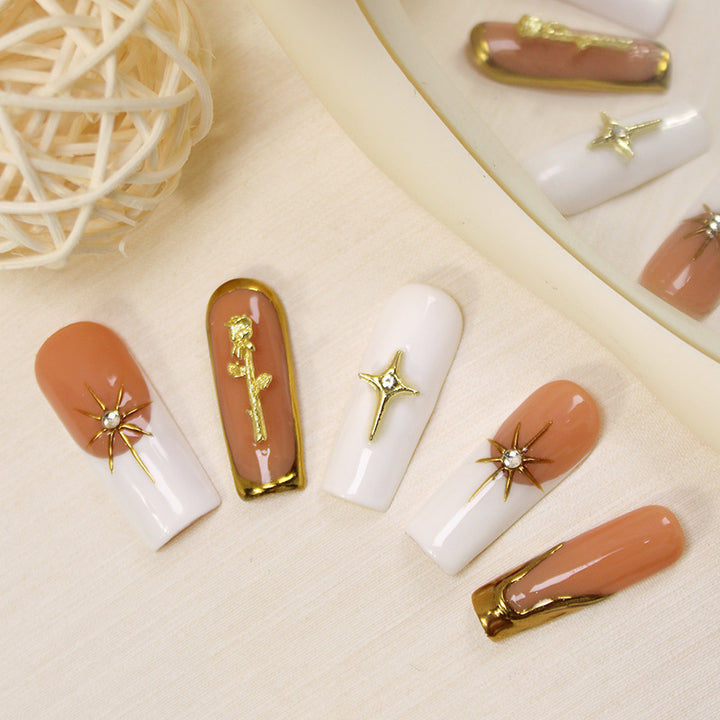 Art nail set with romantic flower and glamour accents Kalsten