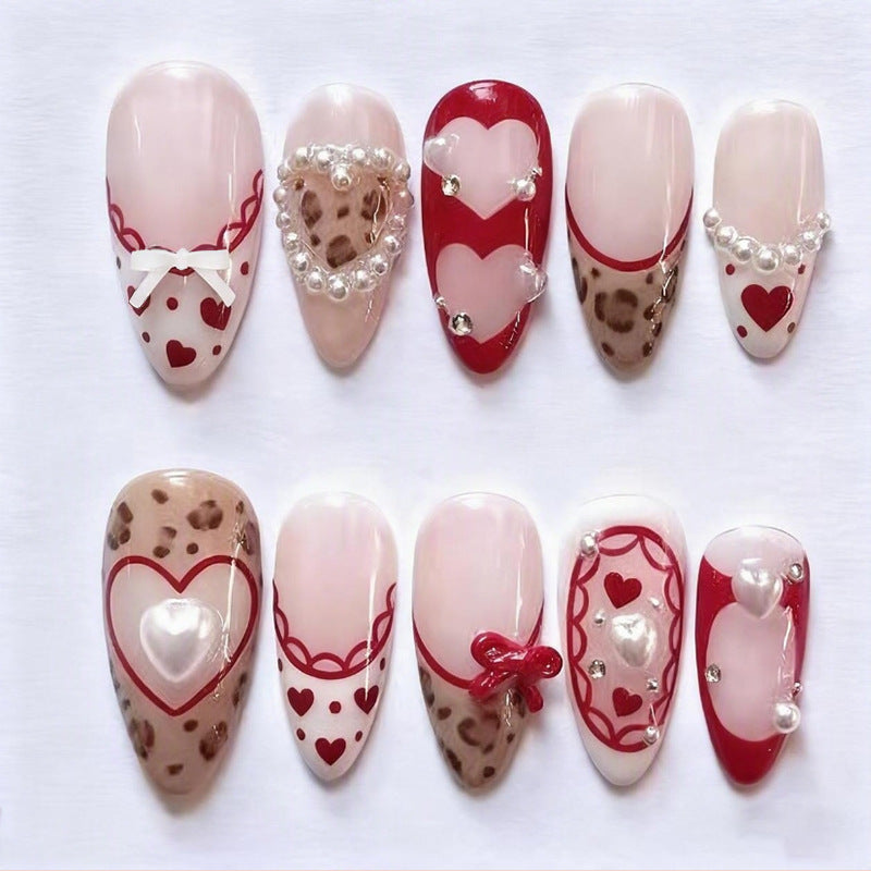 Nail set with romantic heart and bow decorations Kalsten