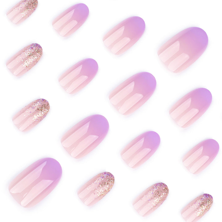 Artful nail art with ombre design and glitter accents Kalsten