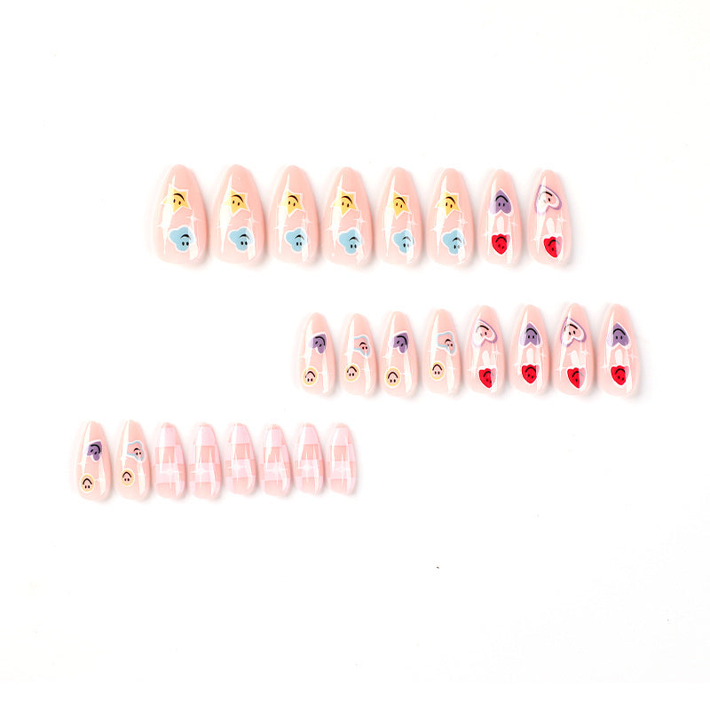 Creative nail art with playful emoji motifs Kalsten