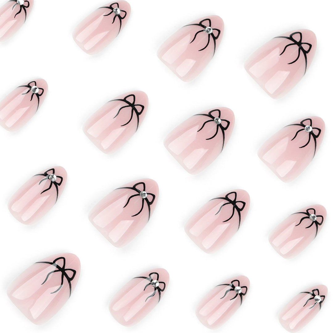 Artful nail art with elegant bow designs Kalsten