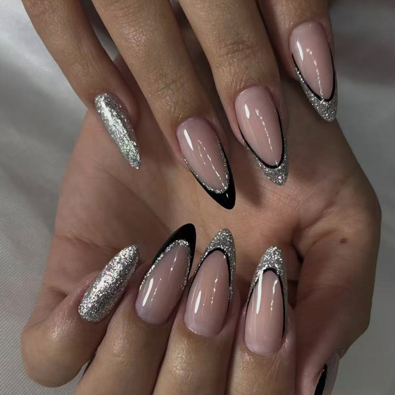 Artificial nail set with glamorous glitter accents and elegant black Kalsten