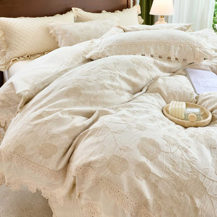 Vintage-inspired cotton-linen bedding set with lace trim and quilting pattern