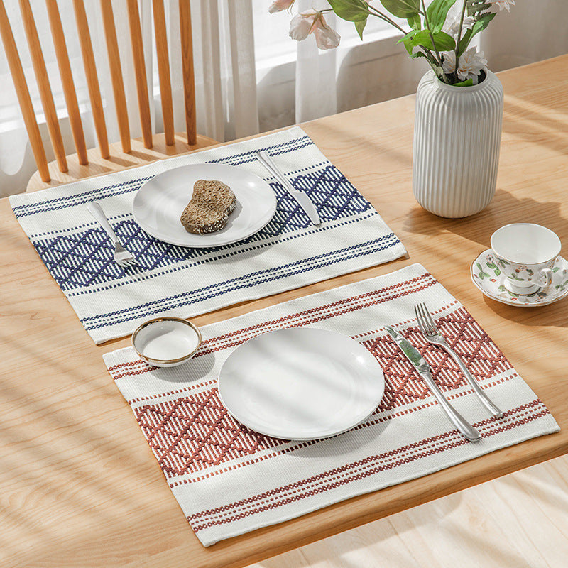 Flat woven placemat with woven diamond jacquard pattern
