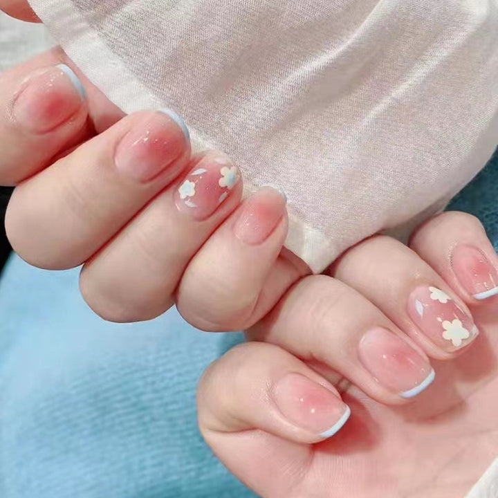 Artistic gel nails with delicate floral designs Kalsten