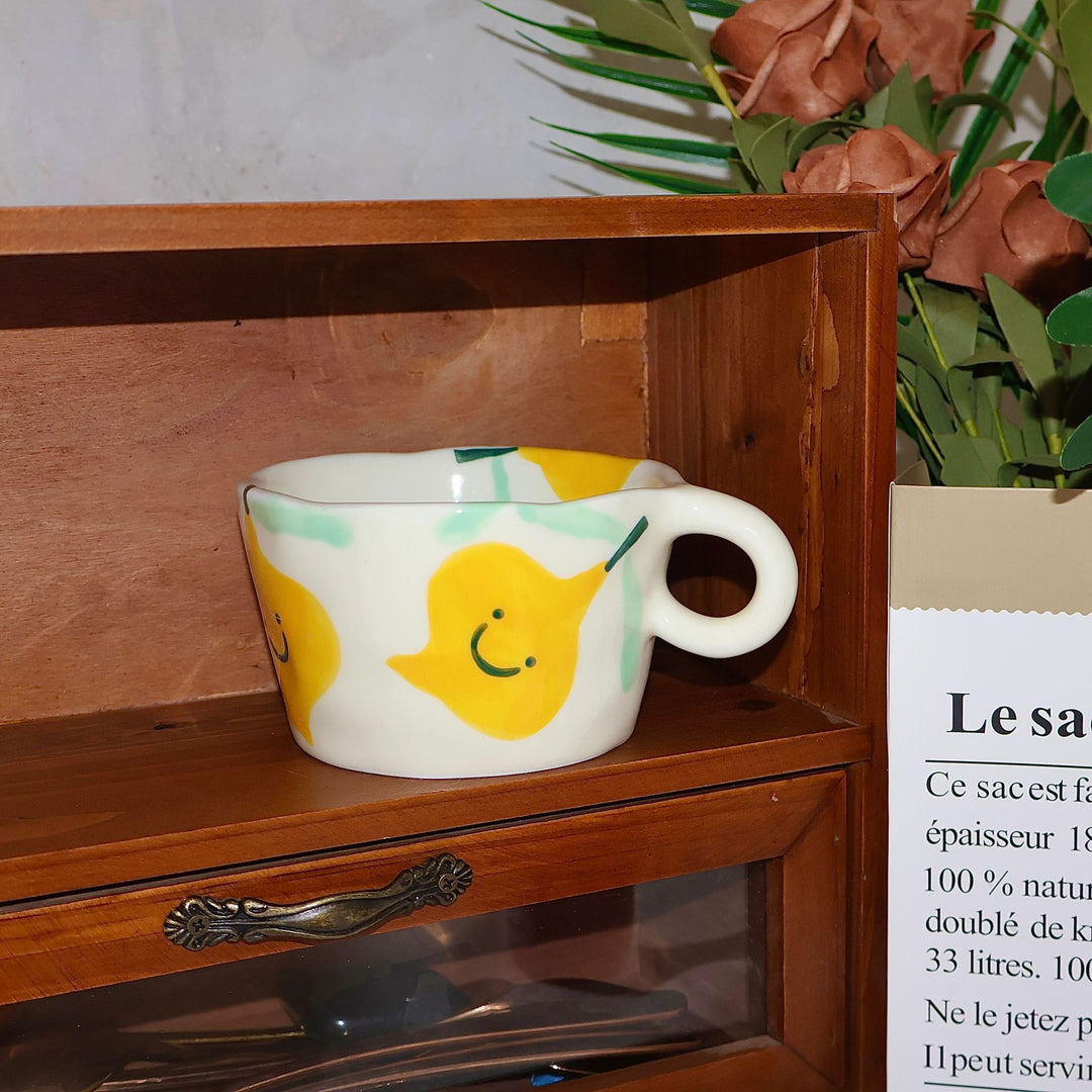 Ceramic mug with hand-painted penguin pattern