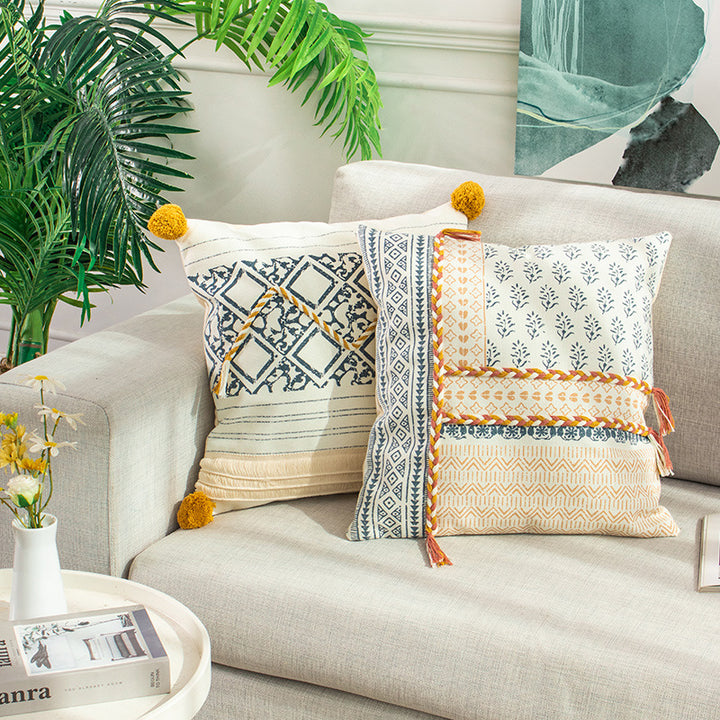 Square decorative pillow cover in Boho block print with braided tassels