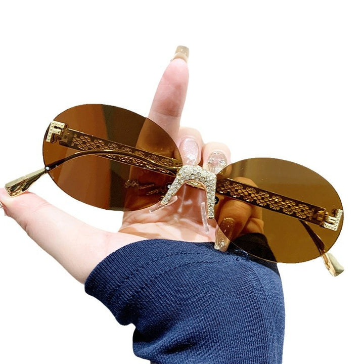 Women's sunglasses with glittering frame and oval lenses Kalsten