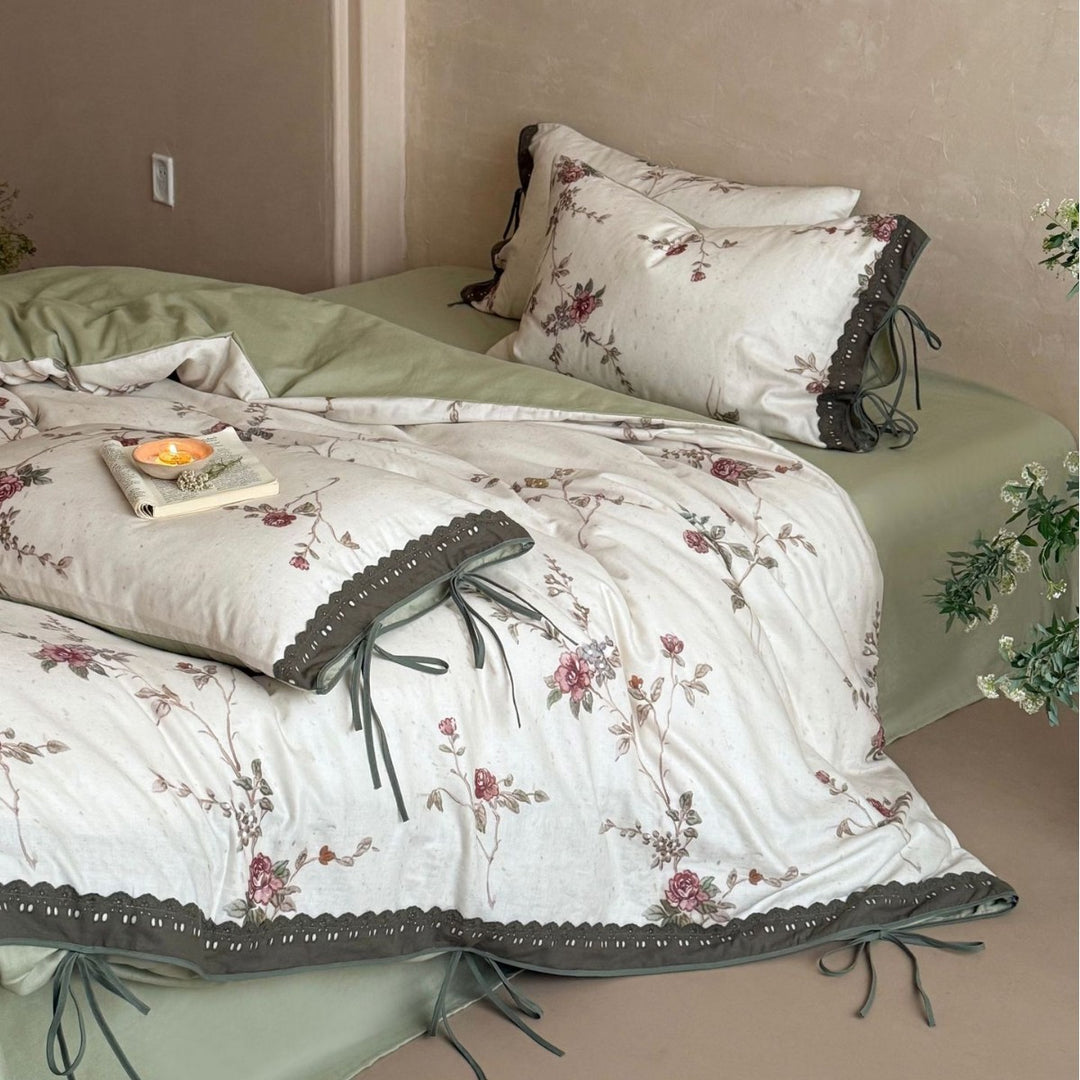 Percale bedding set with floral vintage embroidery, lace trim, and ties