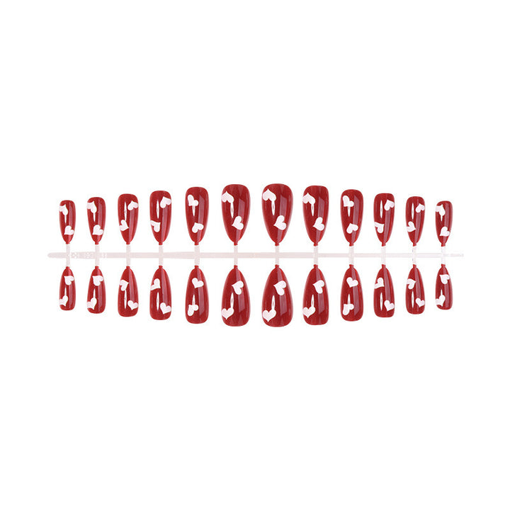 Acrylic nail set with romantic heart designs Kalsten