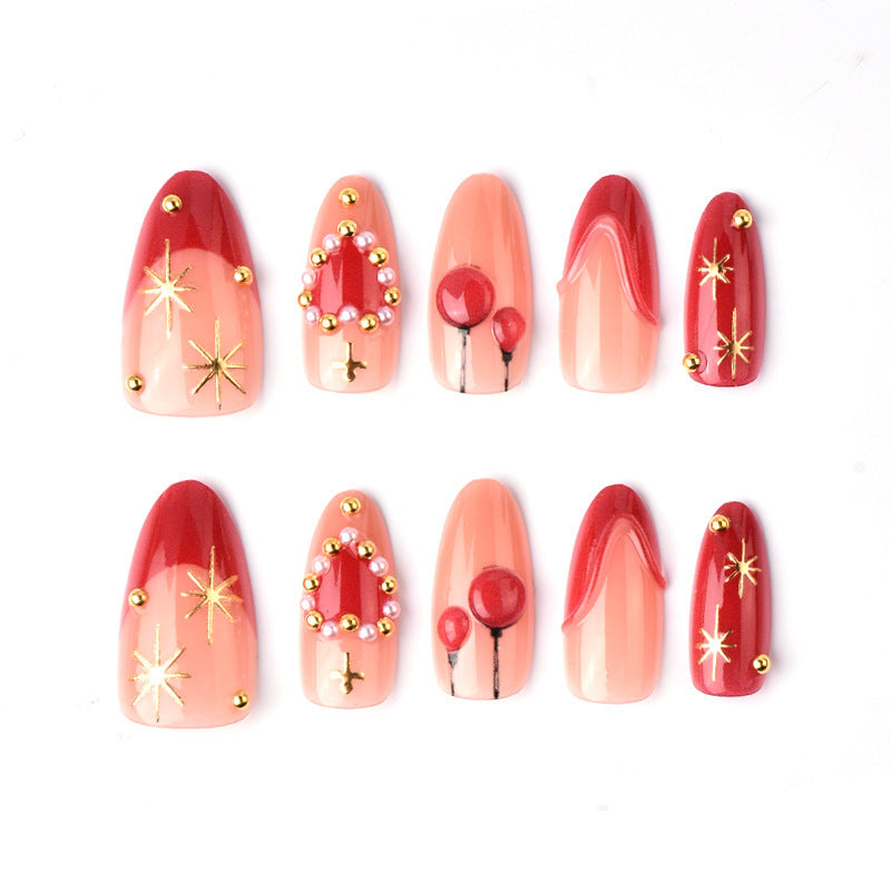 Elegant artificial nails with romantic gold and pearl embellishments Kalsten