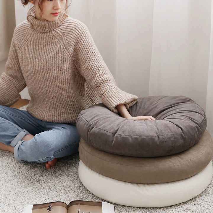 Round seat pouf with soft velvet cover, removable zipper, and shape-stable filling Kalsten