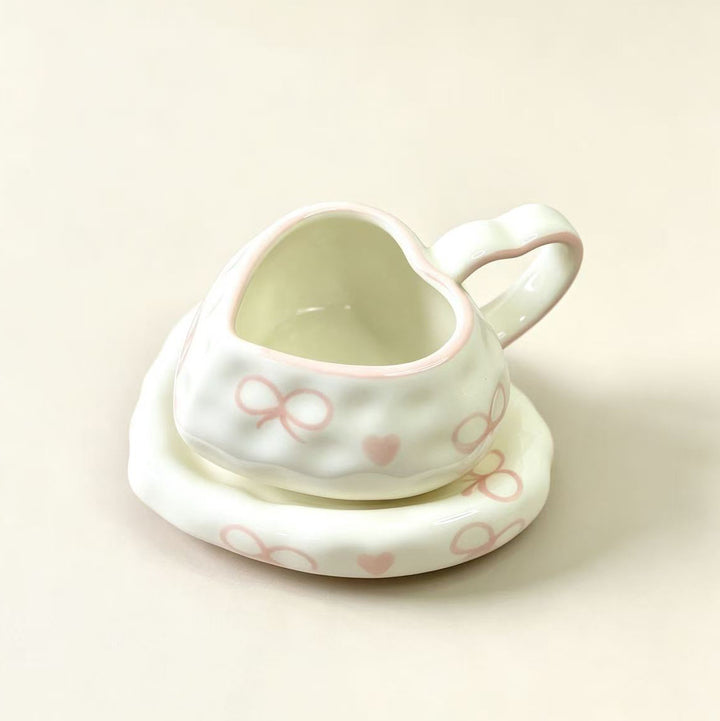 Playful ceramic heart cups with organic cloud saucer