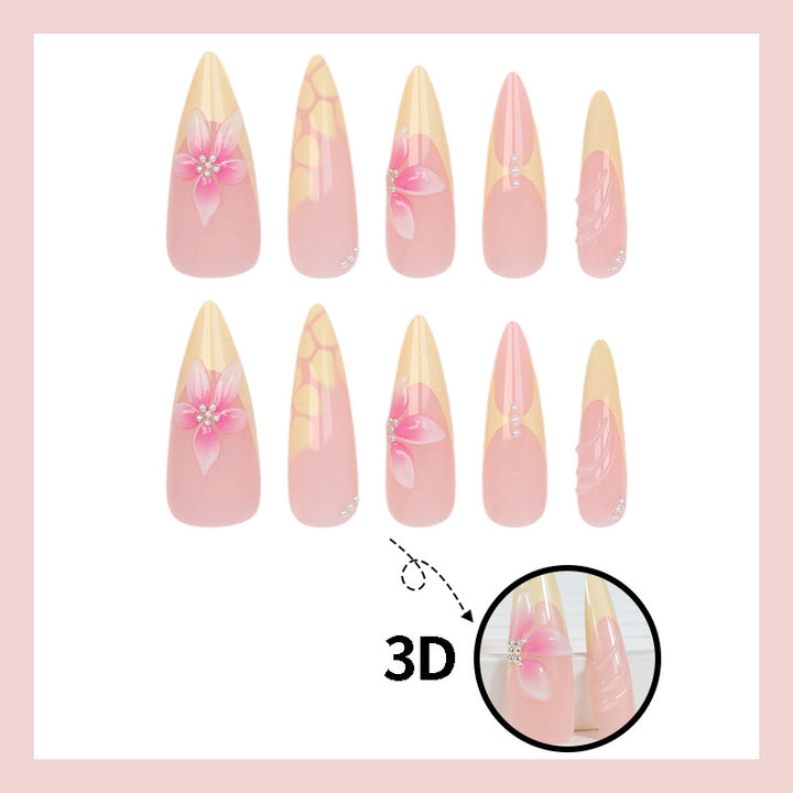 Acrylic nail set with elegant floral pattern and shimmering accents Kalsten