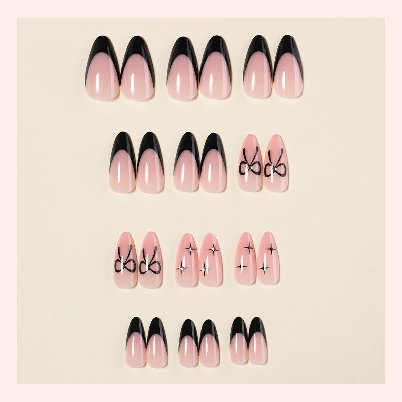 Acrylic nail set with elegant ombre design and creative bow motif Kalsten