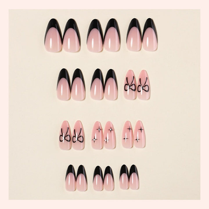 Acrylic nail set with elegant ombre design and creative bow motif Kalsten