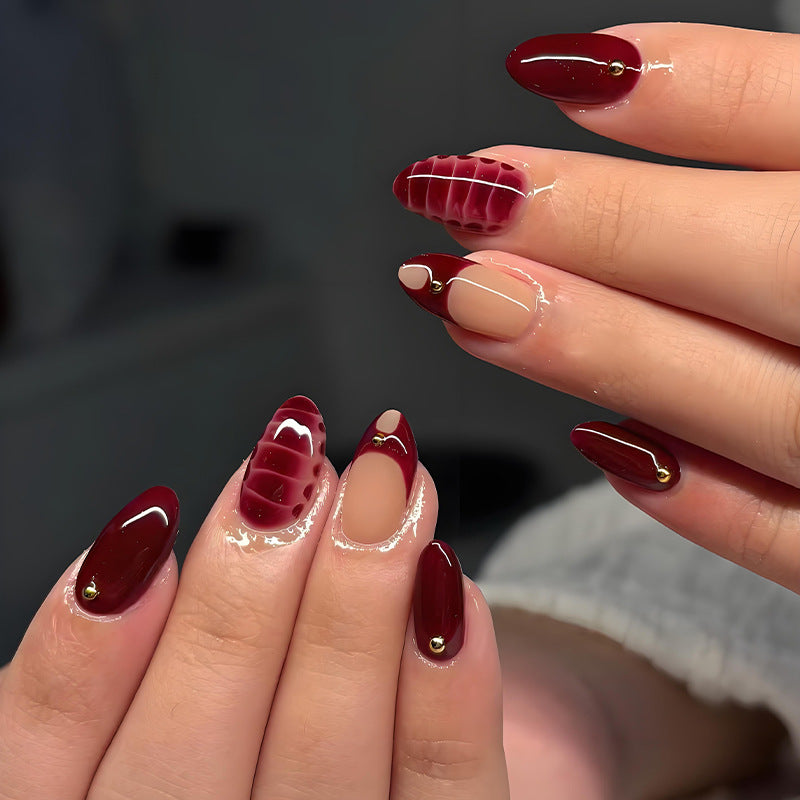 Acrylic nail set with elegant golden accents and trendy design Kalsten