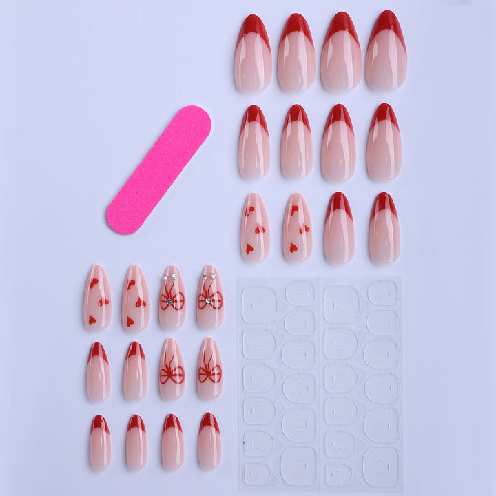 Artificial nails with elegant heart designs and glamorous accents Kalsten