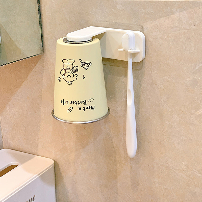 Wall-mounted toothbrush holder with playful design Kalsten