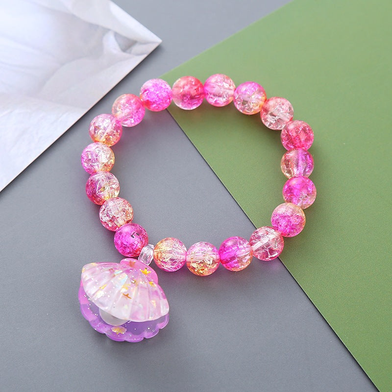 Playful bracelet with shell pendant Kalsten