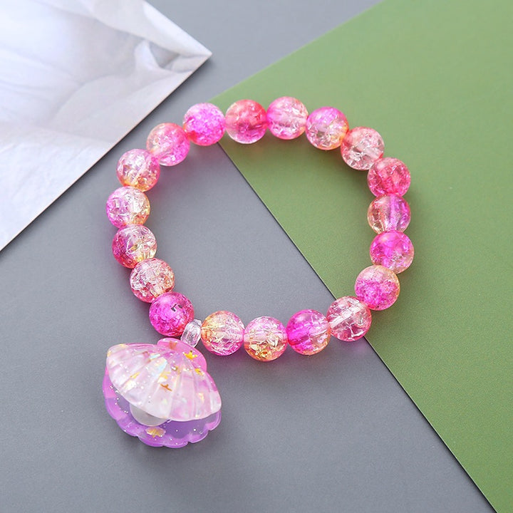 Playful bracelet with shell pendant Kalsten
