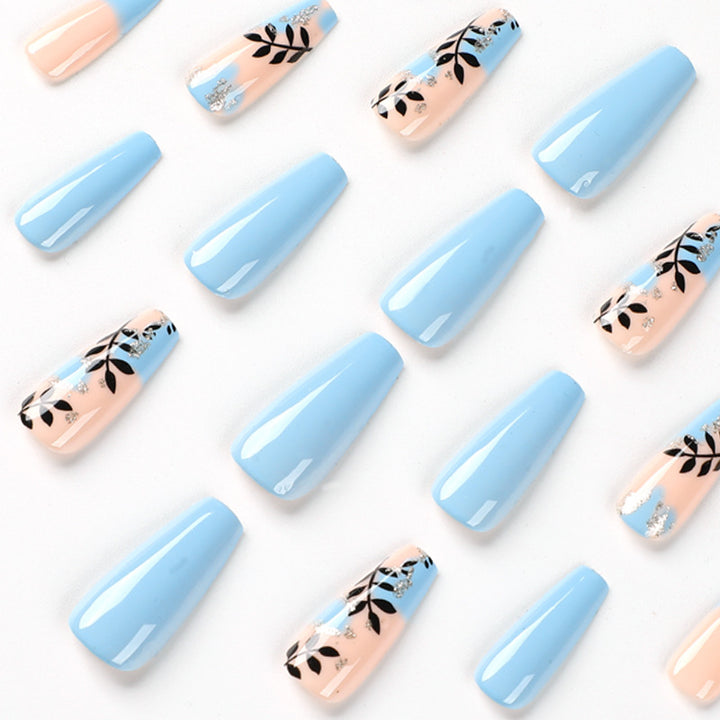Artful Nail Art with Floral Designs and Glitter Kalsten