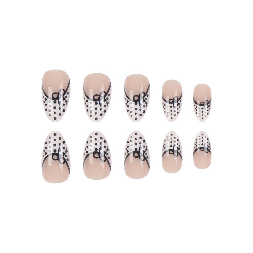 Elegant Stiletto Press-On Nails with Polka Dot Design and Bow Accents Kalsten