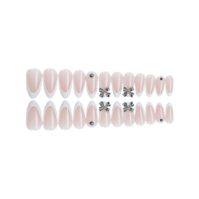 Acrylic nail set with elegant decorative embellishments Kalsten