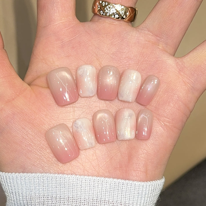 Artificial nails with elegant gradient colors and holographic accents Kalsten