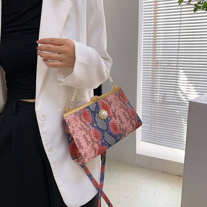 Elegant Pearl-Embellished Snakeskin Clutch Bag