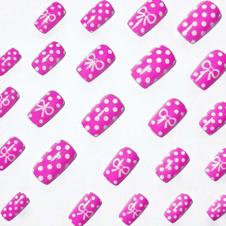 Artificial nails with romantic polka dot pattern and bow Kalsten
