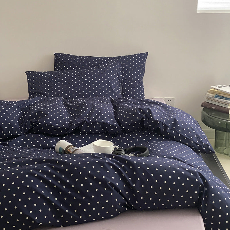 Cotton percale bedding set with minimalist polka dot pattern and hotel closure